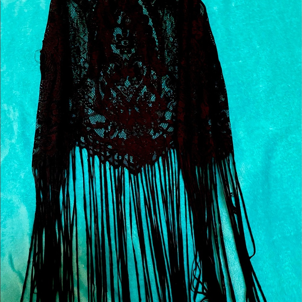Women’s lacy black boho pull on.